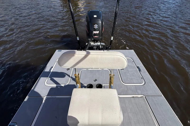 Slide: The Image of 2008 Release Tarpon Bay boat with Suzuki 300 engine on water. - 6