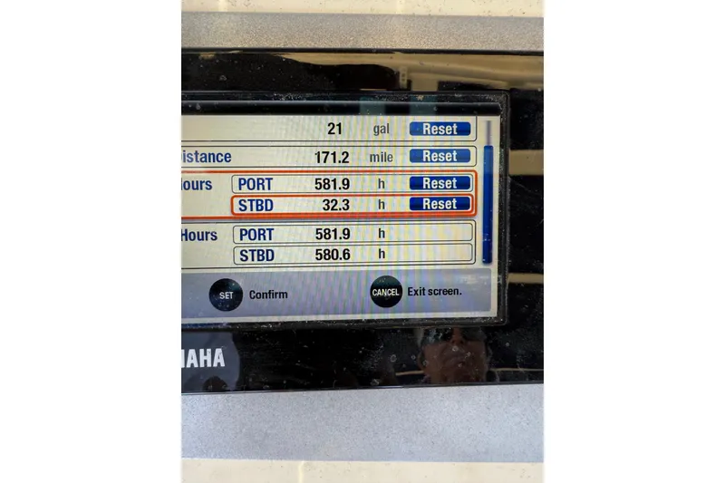 Slide: The Image of Display screen showing engine hours and distance on 2012 Chris-Craft Catalina 29. - 5