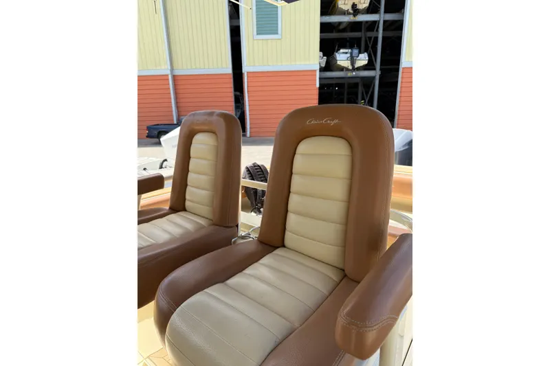 Slide: The Image of Luxurious leather seats on a 2012 Chris-Craft Catalina 29 boat, showcasing comfort and style. - 6