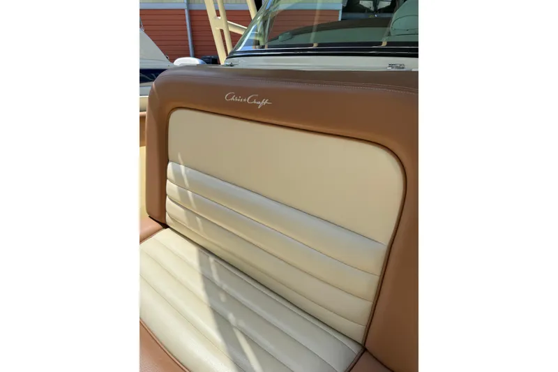 Slide: The Image of 2012 Chris-Craft Catalina 29 boat seat with brown and cream upholstery. - 8