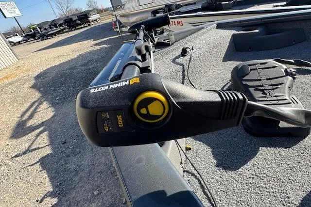 Slide: The Image of 2019 Tracker Pro Team 175 TF boat with Minn Kota trolling motor on deck. - 7
