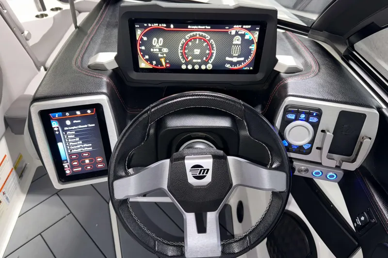 Slide: The Image of 2022 Malibu Wakesetter 25 LSV dashboard with advanced controls and digital displays. - 15