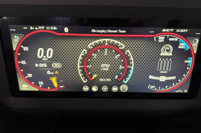 Slide: The Image of Dashboard display of 2022 Malibu Wakesetter 25 LSV boat, showing speed, RPM, and surf settings. - 16