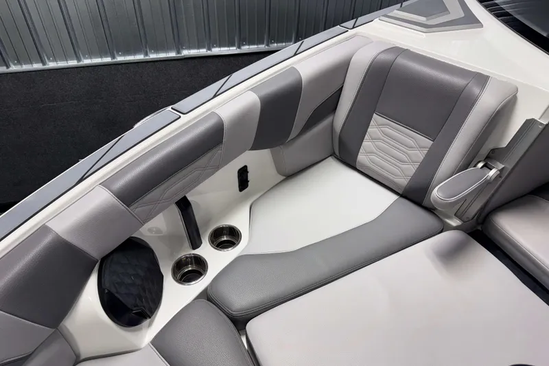Slide: The Image of 2022 Malibu Wakesetter 25 LSV interior with gray and white cushioned seating. - 23