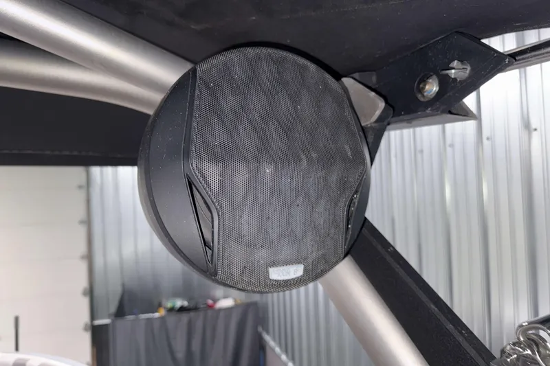 Slide: The Image of Close-up of a speaker on a 2022 Malibu Wakesetter 25 LSV boat. - 25