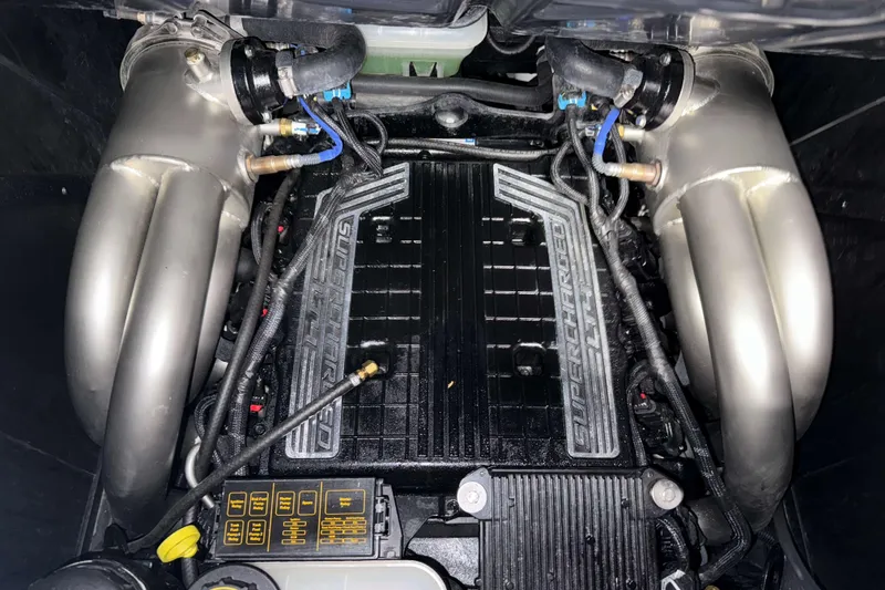 Slide: The Image of 2022 Malibu Wakesetter 25 LSV engine with supercharged components and detailed wiring. - 36