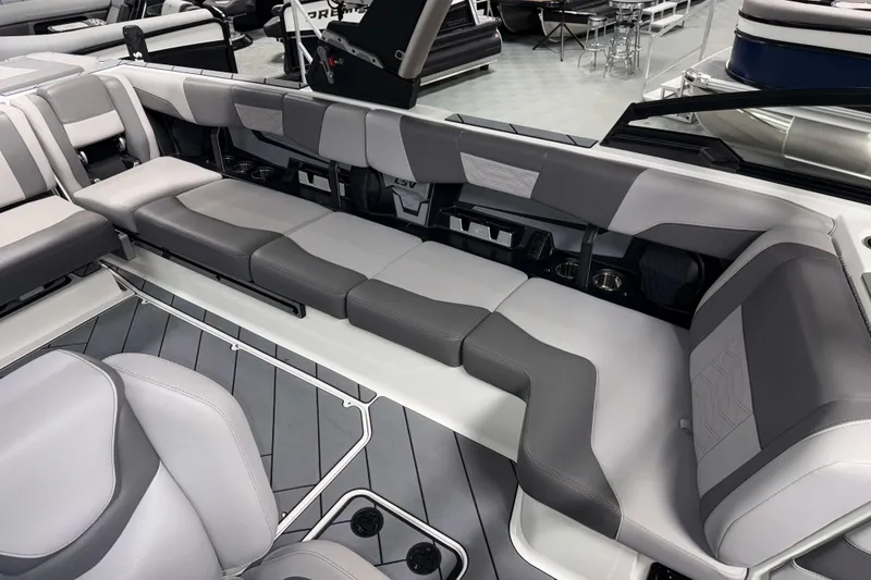 Slide: The Image of 2022 Malibu Wakesetter 25 LSV interior with gray seating and modern design. - 8