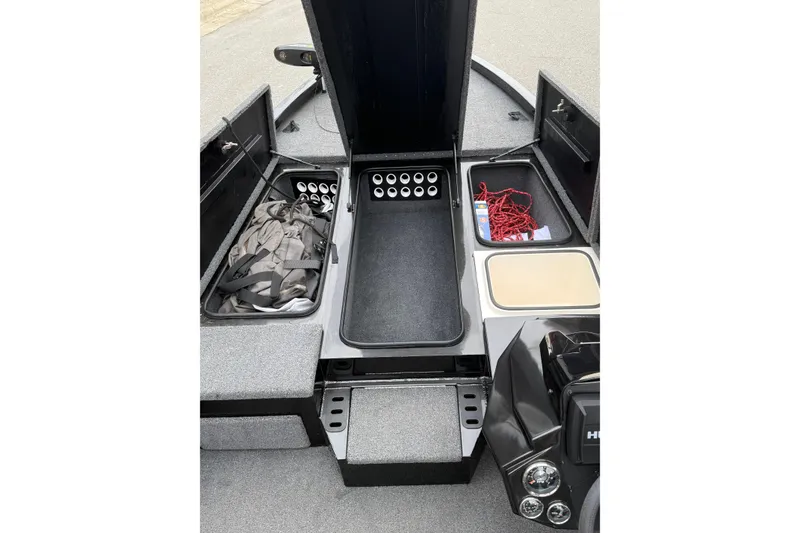 Slide: The Image of 2021 Vexus AVX2080 boat storage compartments with gear and accessories. - 7