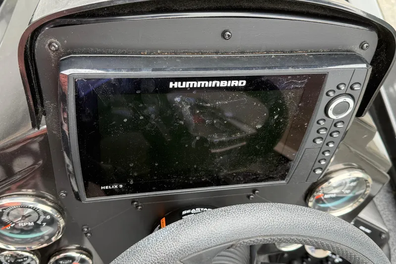 Slide: The Image of Dashboard of a 2021 Vexus AVX2080 with Humminbird Helix 9 fishfinder. - 8