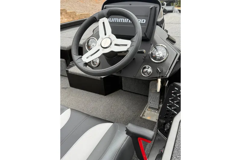 Slide: The Image of 2021 Vexus AVX2080 boat cockpit with steering wheel and control panel. - 9