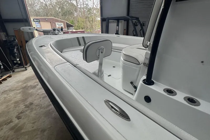 Slide: The Image of 2023 Contender 25 Bay boat interior, featuring sleek design and modern amenities. - 10