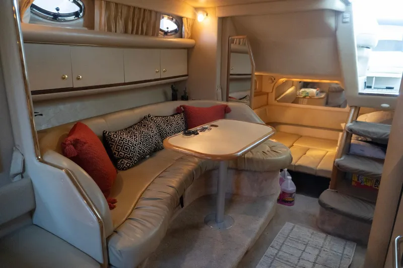 Slide: The Image of Interior of 1998 Sea Ray Sundancer 330 yacht with cozy seating and elegant decor. - 27