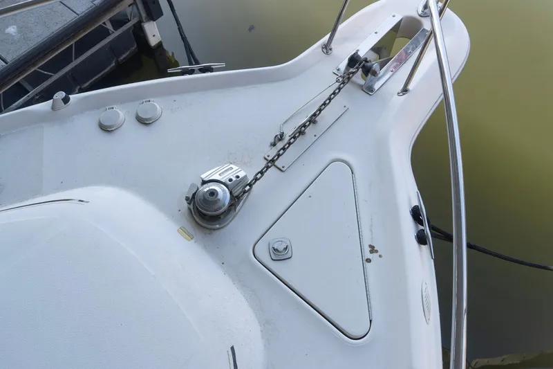 Slide: The Image of Bow of a 1998 Sea Ray Sundancer 330 with anchor chain and winch. - 33