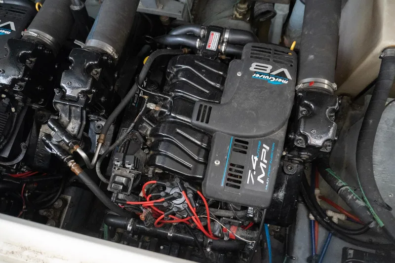 Slide: The Image of Engine compartment of a 1998 Sea Ray Sundancer 330 with MerCruiser V8 engine. - 36