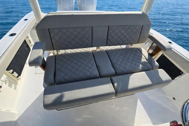 Slide: The Image of Luxury seating on 2025 Pursuit S 288 Sport boat with quilted upholstery. - 9