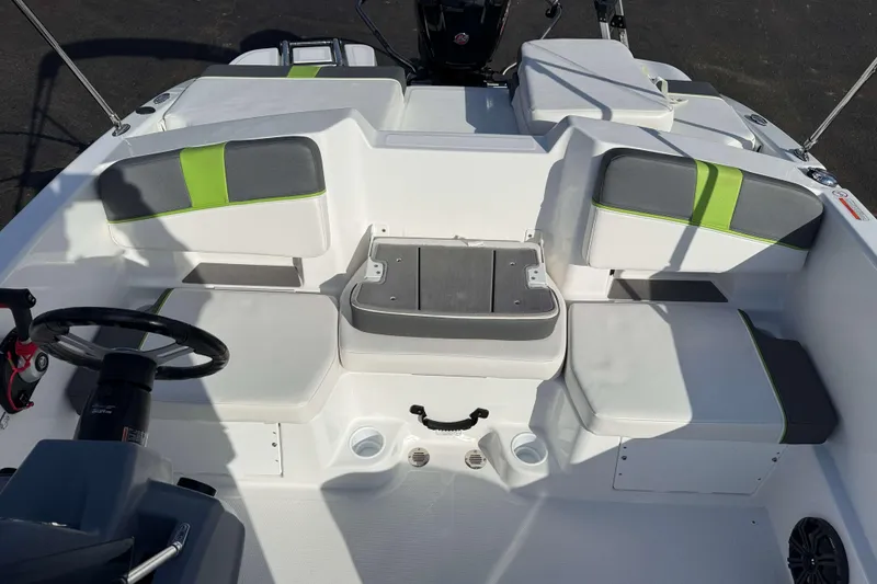Slide: The Image of 2022 Tahoe T18 boat interior with seating and steering wheel. - 6