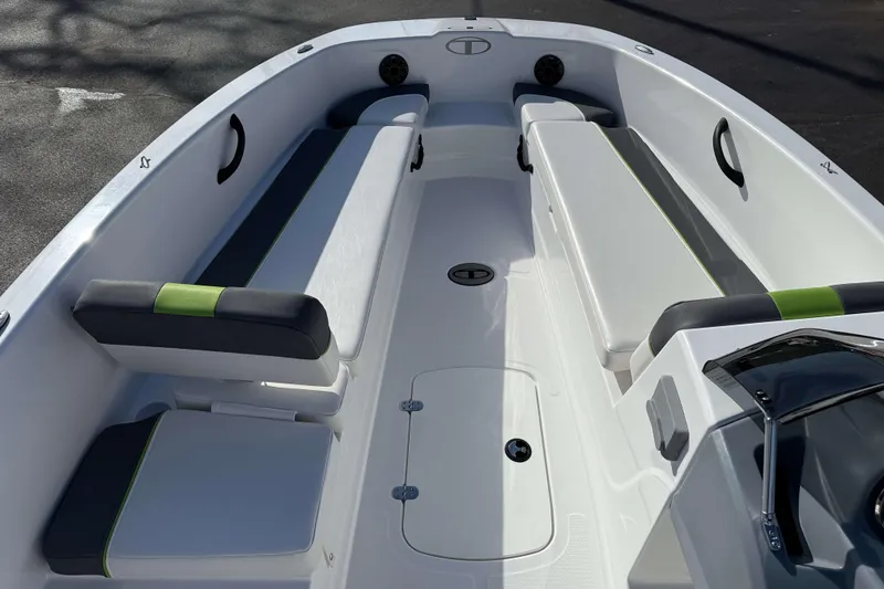 Slide: The Image of 2022 Tahoe T18 boat interior with sleek seating and modern design. - 8