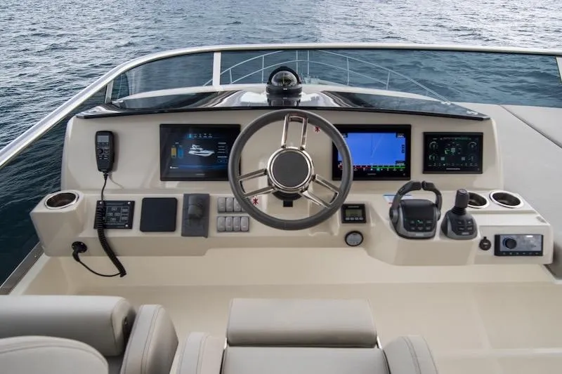Slide: The Image of Helm of 2023 Absolute 62 Fly yacht with advanced navigation systems. - 25