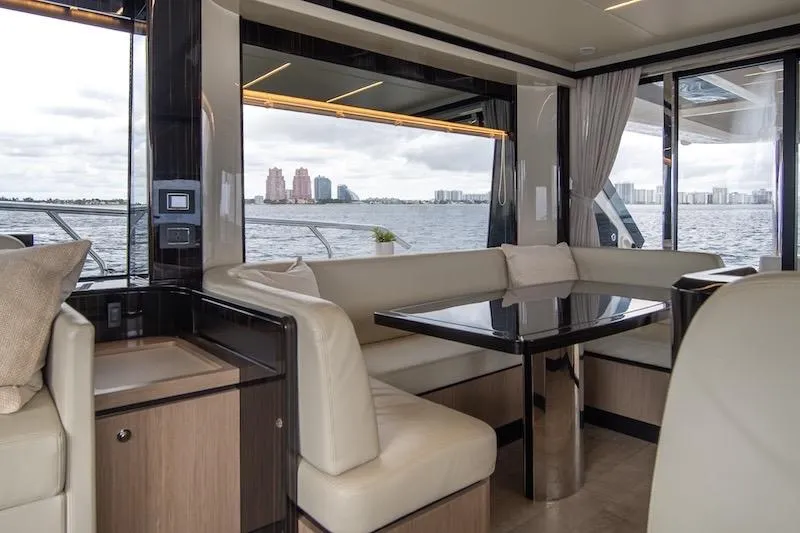 Slide: The Image of Luxurious interior of 2023 Absolute 62 Fly yacht with waterfront view. - 33