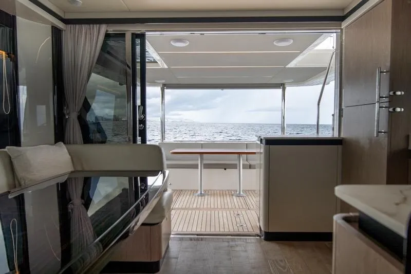 Slide: The Image of Luxurious interior of 2023 Absolute 62 Fly yacht with ocean view. - 51