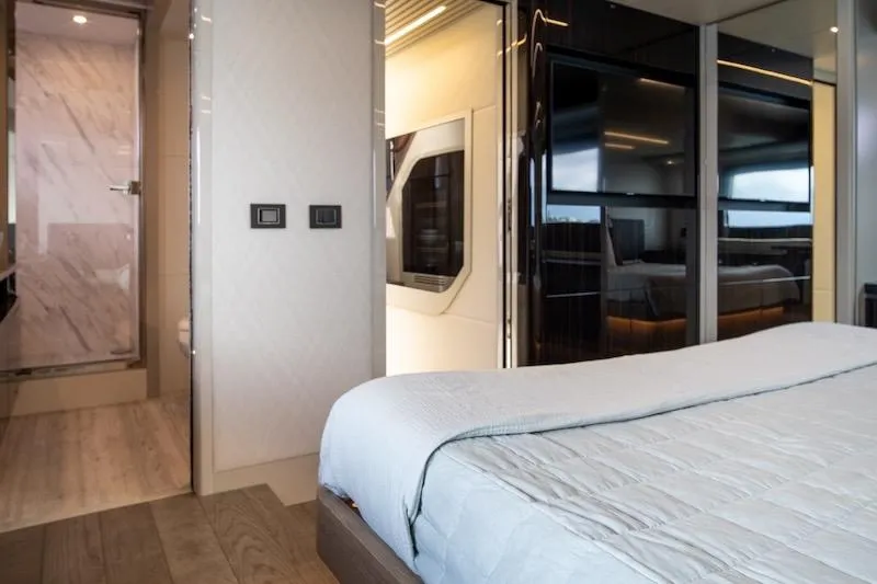 Slide: The Image of Luxurious interior of 2023 Absolute 62 Fly yacht bedroom with modern design. - 62