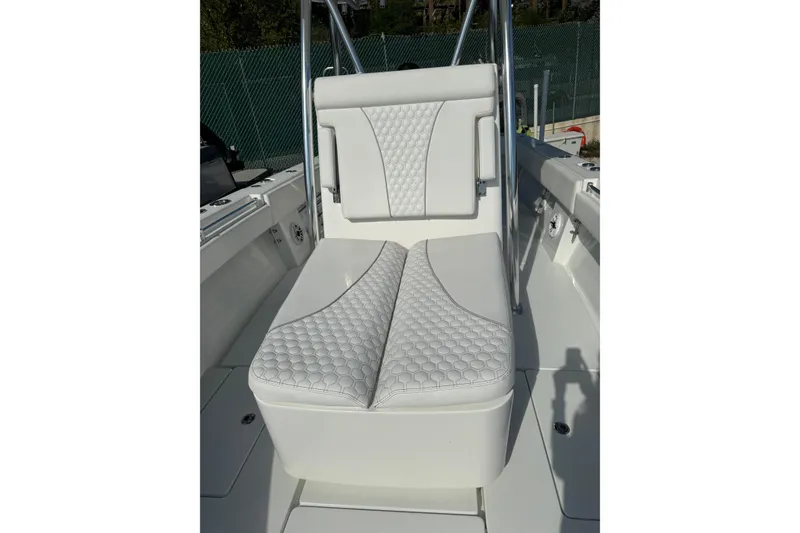 Slide: The Image of 2025 Contender 30 Tournament boat with white cushioned seating and sleek design. - 12