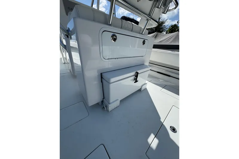 Slide: The Image of 2025 Contender 30 Tournament boat interior with storage compartments and seating. - 17