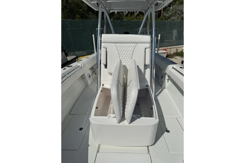 Slide: The Image of 2025 Contender 30 Tournament boat interior with open storage compartment. - 20