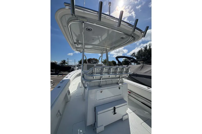 Slide: The Image of 2025 Contender 30 Tournament boat, featuring sleek design and modern amenities under a sunny sky. - 3