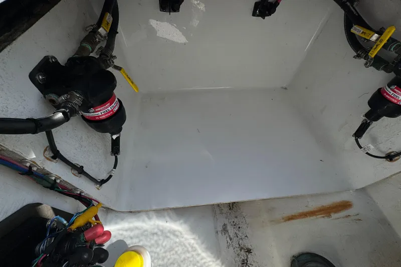 Slide: The Image of Interior view of a 2025 Contender 30 Tournament boat showing fuel system components. - 31