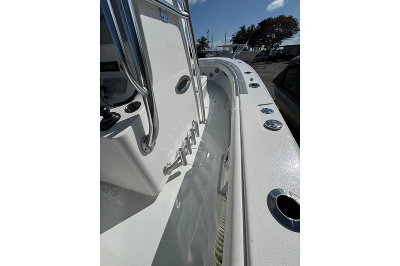 Slide: The Image of 2025 Contender 30 Tournament boat interior with sleek design and stainless steel fixtures. - 8