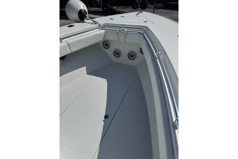 Slide: The Image of 2025 Contender 30 Tournament boat interior with sleek design and stainless steel railings. - 9