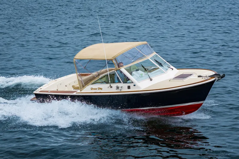 Slide: The Image of 2006 Hunt Yachts Harrier 25 cruising on open water. - 1