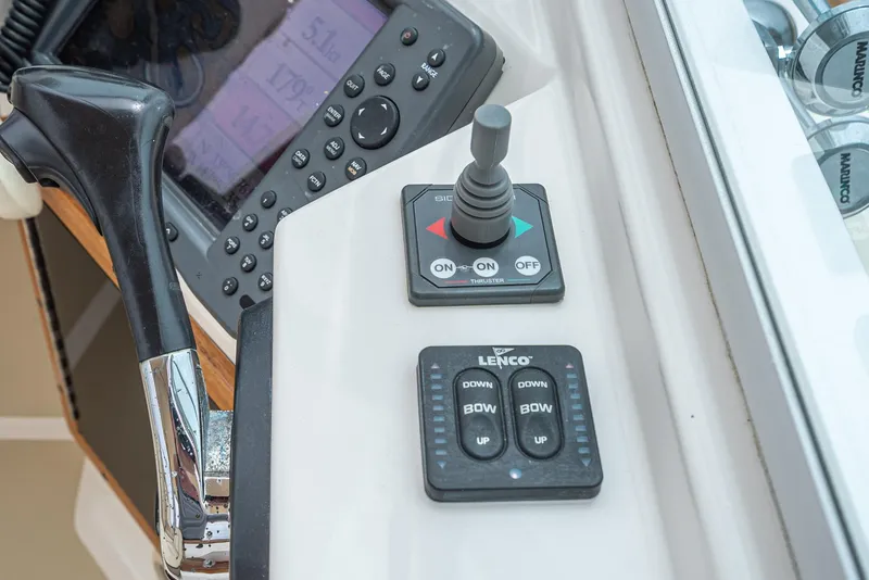 Slide: The Image of Control panel of 2006 Hunt Yachts Harrier 25 with joystick and navigation equipment. - 30