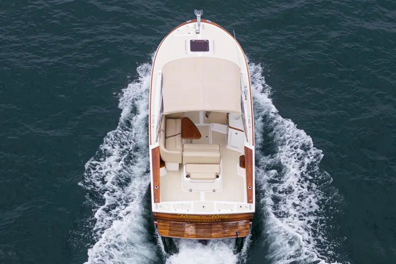 Slide: The Image of 2006 Hunt Yachts Harrier 25 cruising on open water, top view. - 8