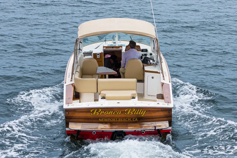 Slide: The Image of 2006 Hunt Yachts Harrier 25 cruising on water, rear view, Newport Beach. - 9
