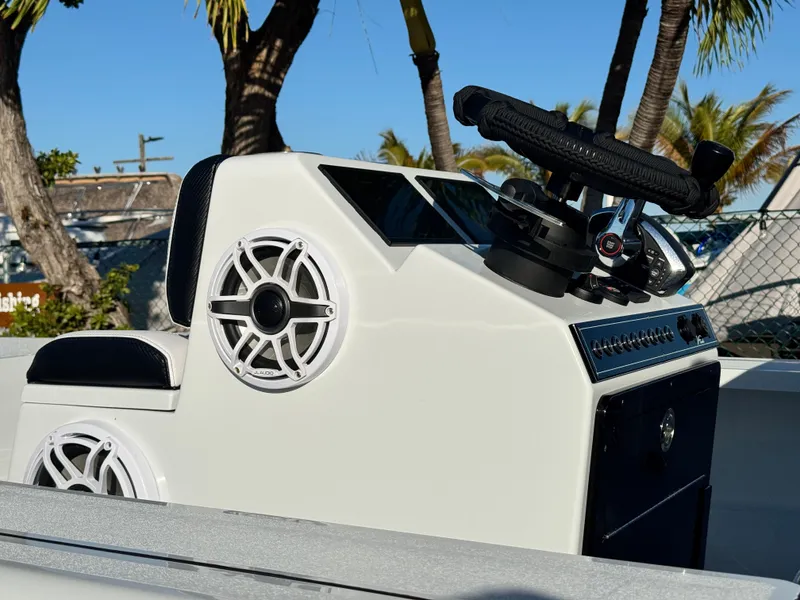 Slide: The Image of Vtech 18 FLATS 2026 boat console with speakers and controls. - 12