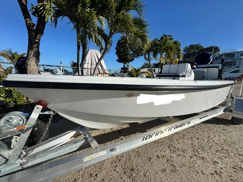 Slide: The Image of Vtech 18 FLATS boat on trailer, 2026 model, sunny day. - 13