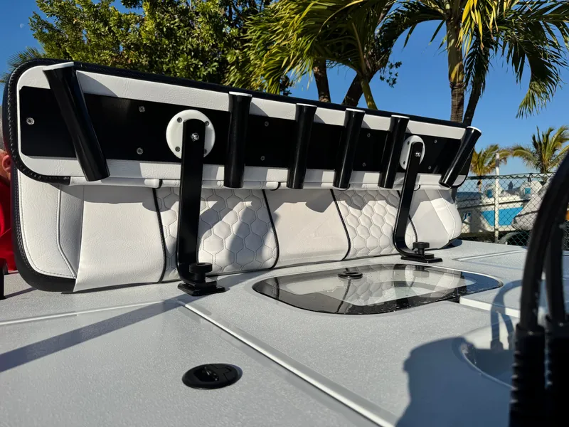 Slide: The Image of Vtech 18 FLATS 2026 boat with fishing rod holders. - 16