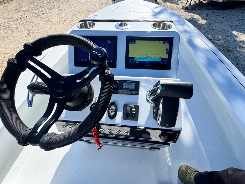 Slide: The Image of Vtech 18 FLATS 2026 helm with advanced navigation systems. - 2