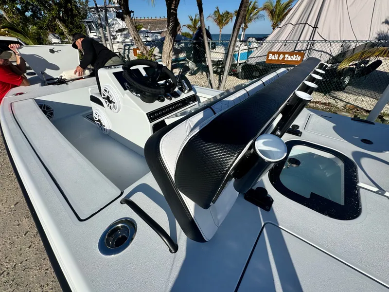 Slide: The Image of Vtech 18 FLATS boat 2026, modern design, fishing, coastal scenery. - 22