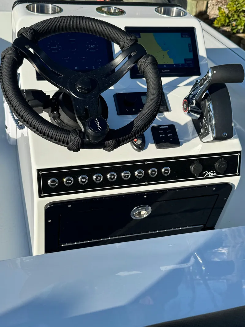 Slide: The Image of Vtech 18 FLATS boat steering console, model year 2026. - 26