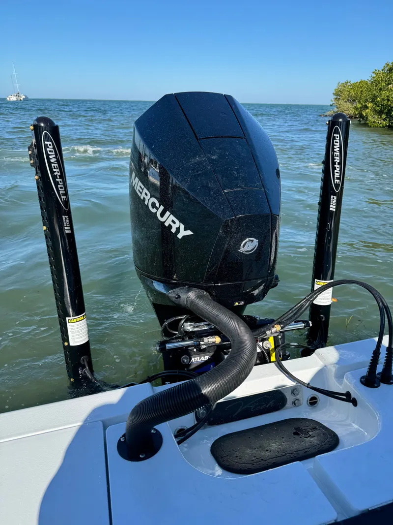 Slide: The Image of Vtech 18 FLATS boat with Mercury outboard motor, 2026 model. - 3