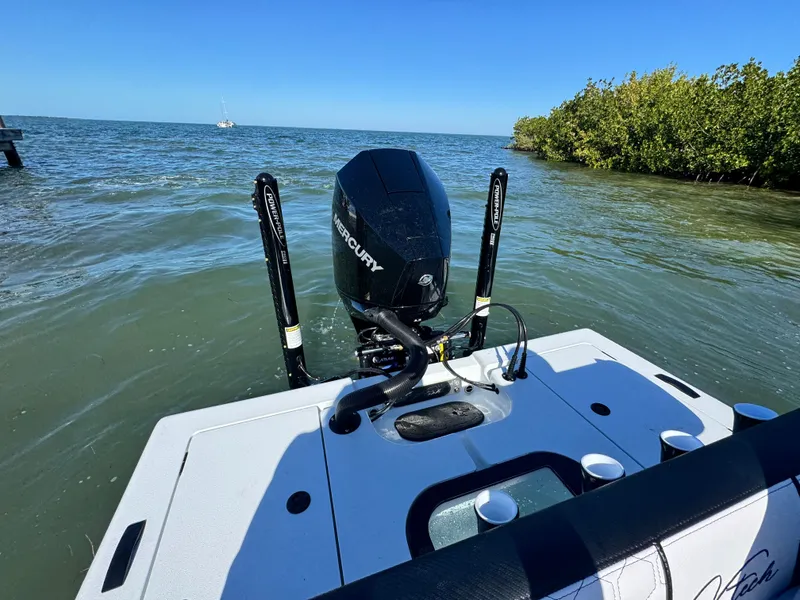 Slide: The Image of Vtech 18 FLATS boat with Mercury engine on open water, 2026 model. - 33