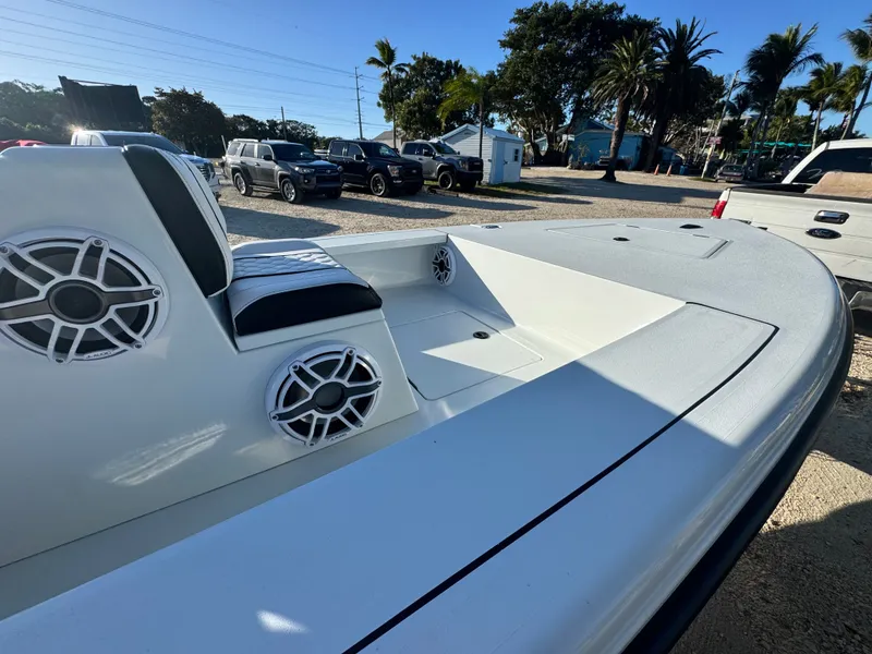 Slide: The Image of Vtech 18 FLATS boat 2026 with speakers and seating. - 4