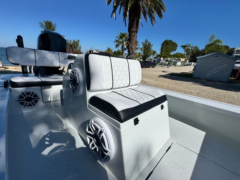 Slide: The Image of Vtech 18 FLATS boat 2026 with stylish seating and speakers. - 40