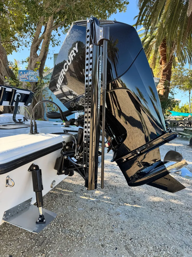 Slide: The Image of Vtech 18 FLATS 2026 boat with Mercury outboard motor. - 47