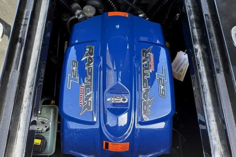 Slide: The Image of 2021 Moomba Makai Raptor 6.2L engine, blue cover, powerful performance. - 11