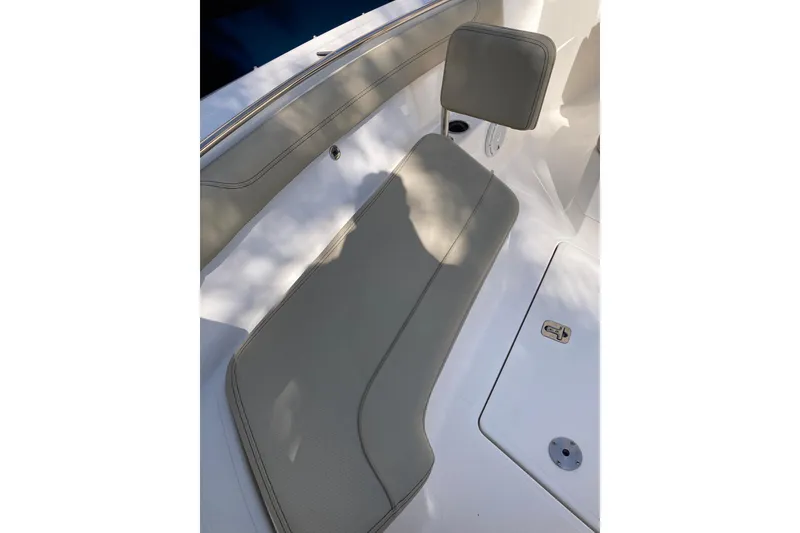 Slide: The Image of 2019 Pursuit S 288 Sport boat seat with cushion and backrest, in sunlight. - 20