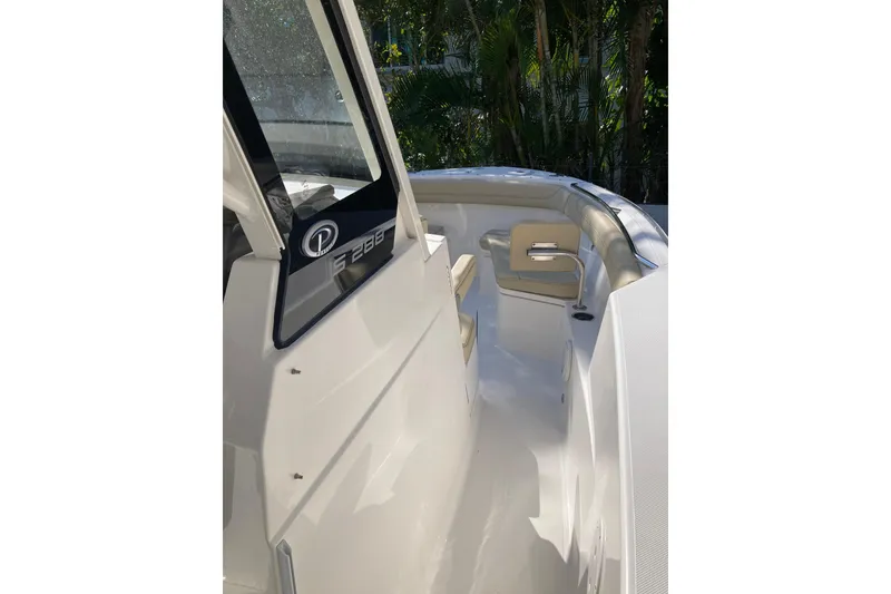 Slide: The Image of 2019 Pursuit S 288 Sport boat interior with seating and sleek design. - 30